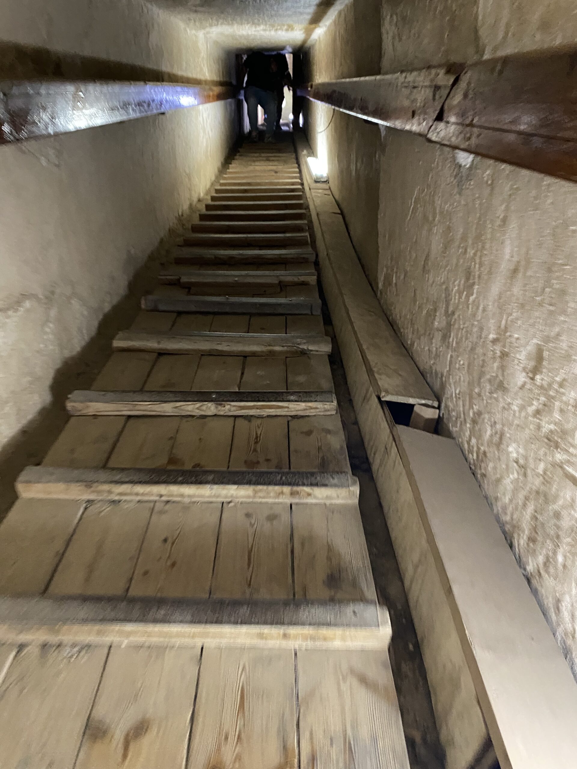 the steep ramp/stairs leading down into the pyramid