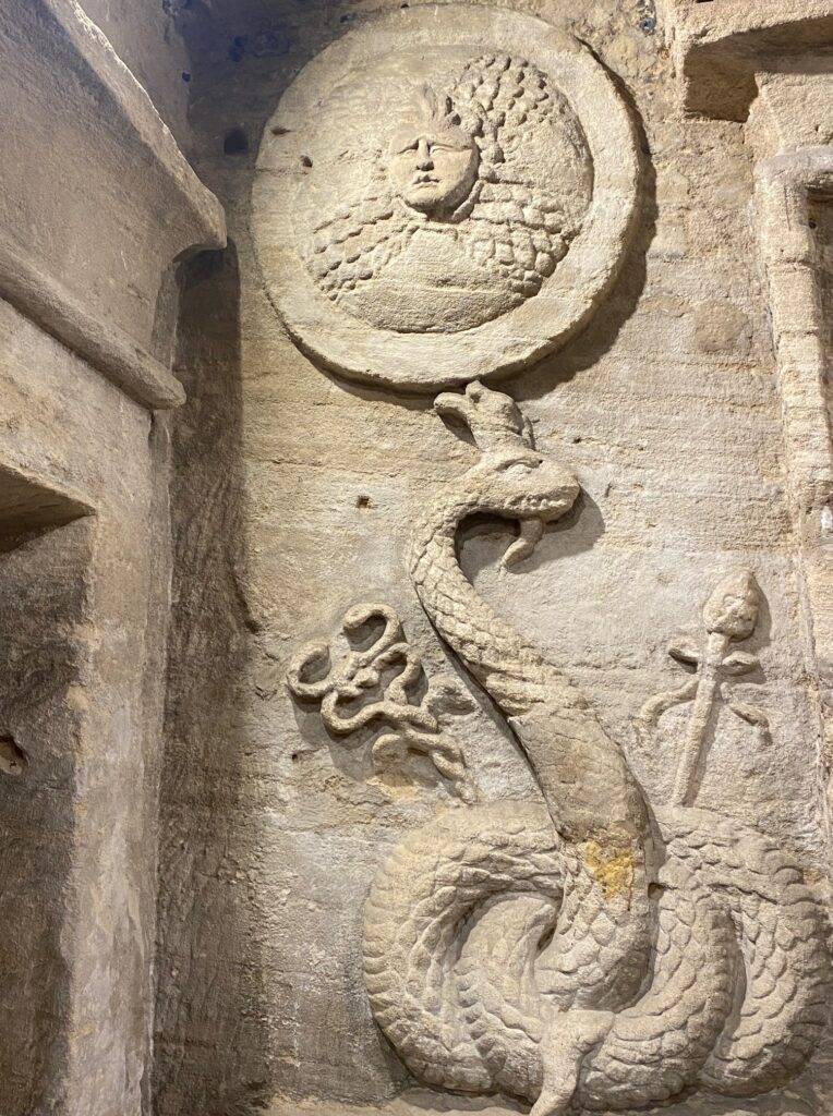 carving of a snake on the stone