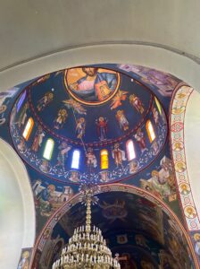 dome of the inside of the church with paintings