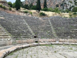 old amphitheater (circular area with stone steps/seating)